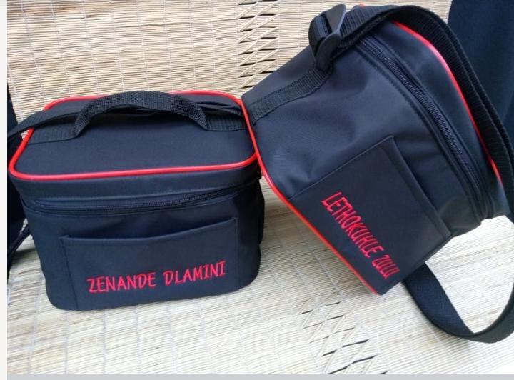 Black and blue cooler bags with names